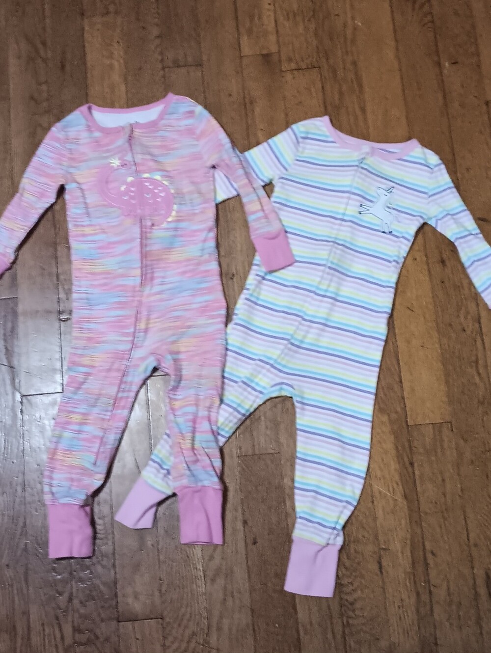 Pair of Girls' Pink Footie Pajama with Cuffed Ankles